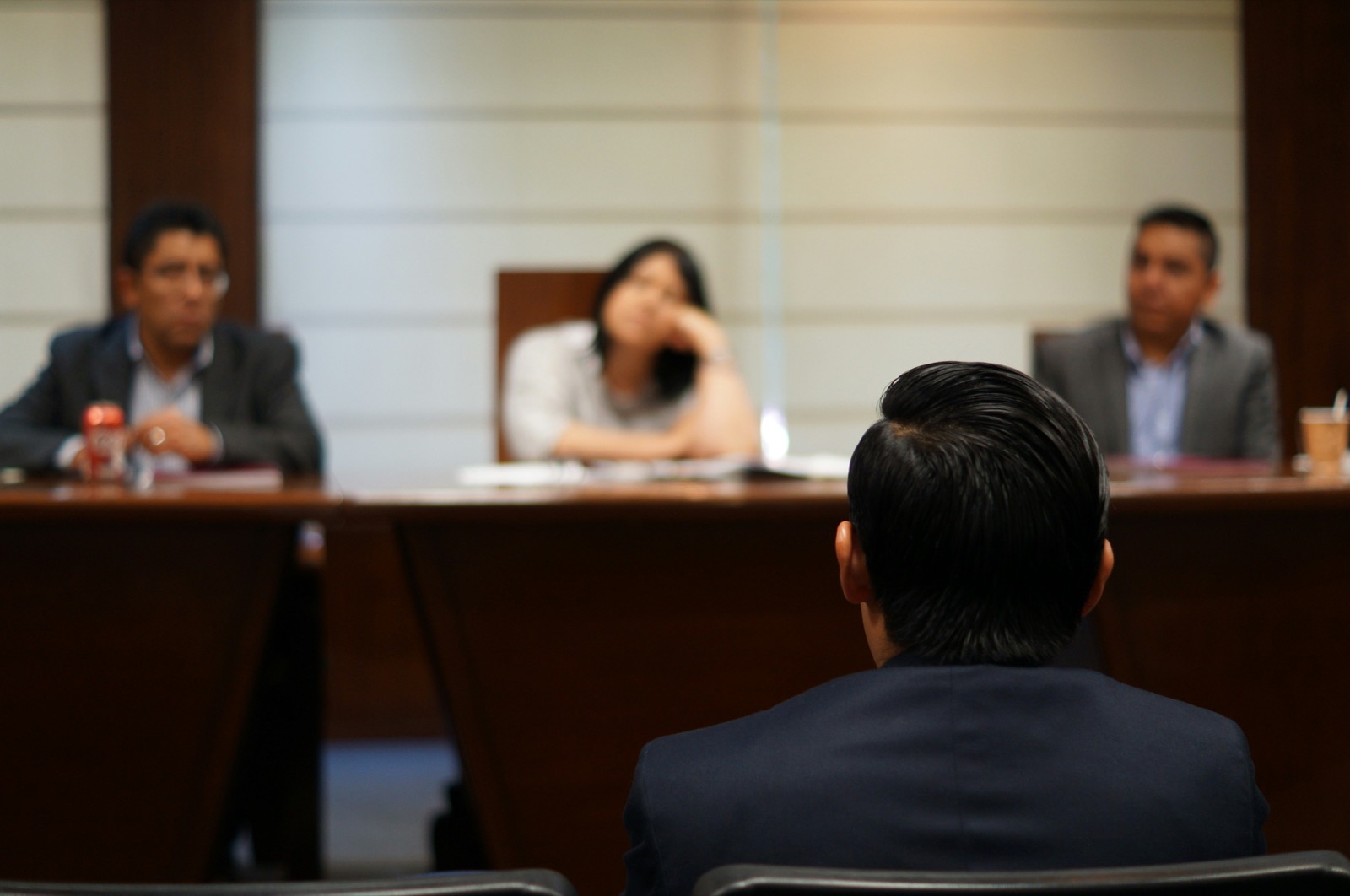 A formal panel hearing with three interviewers