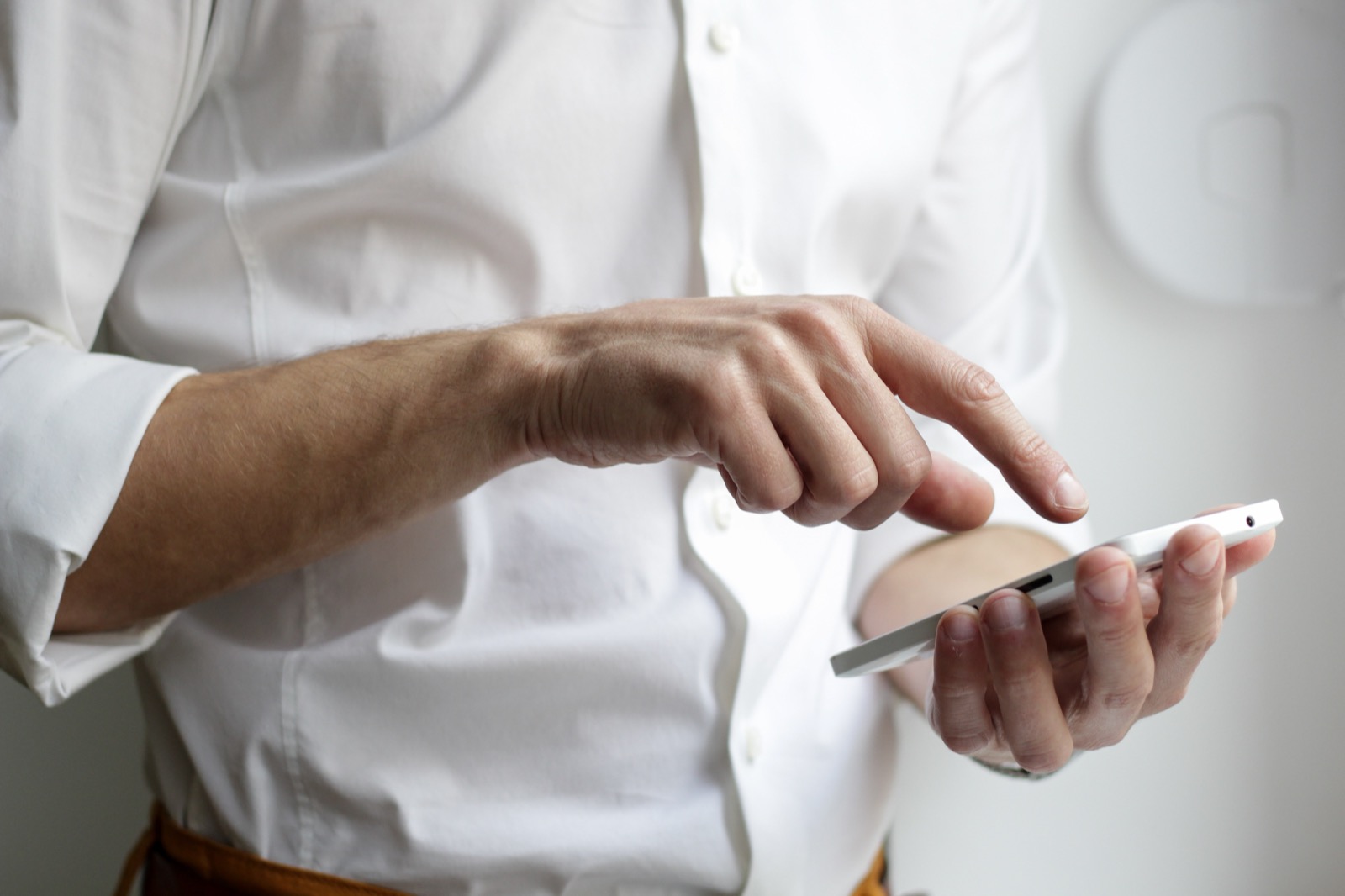 Person using a smartphone to access community support services
